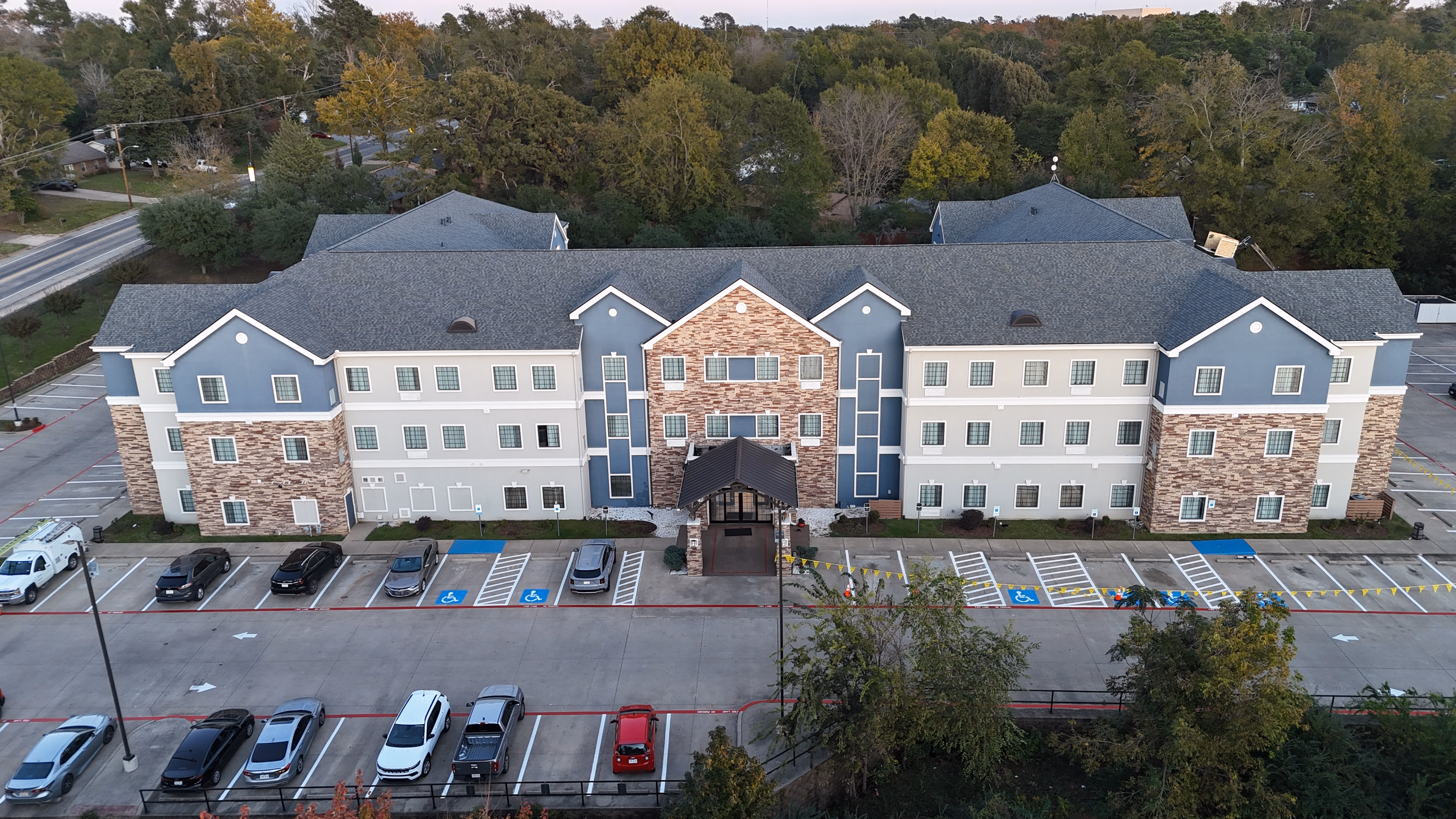 Commercial roof leak repair with asphalt shingles — East Texas