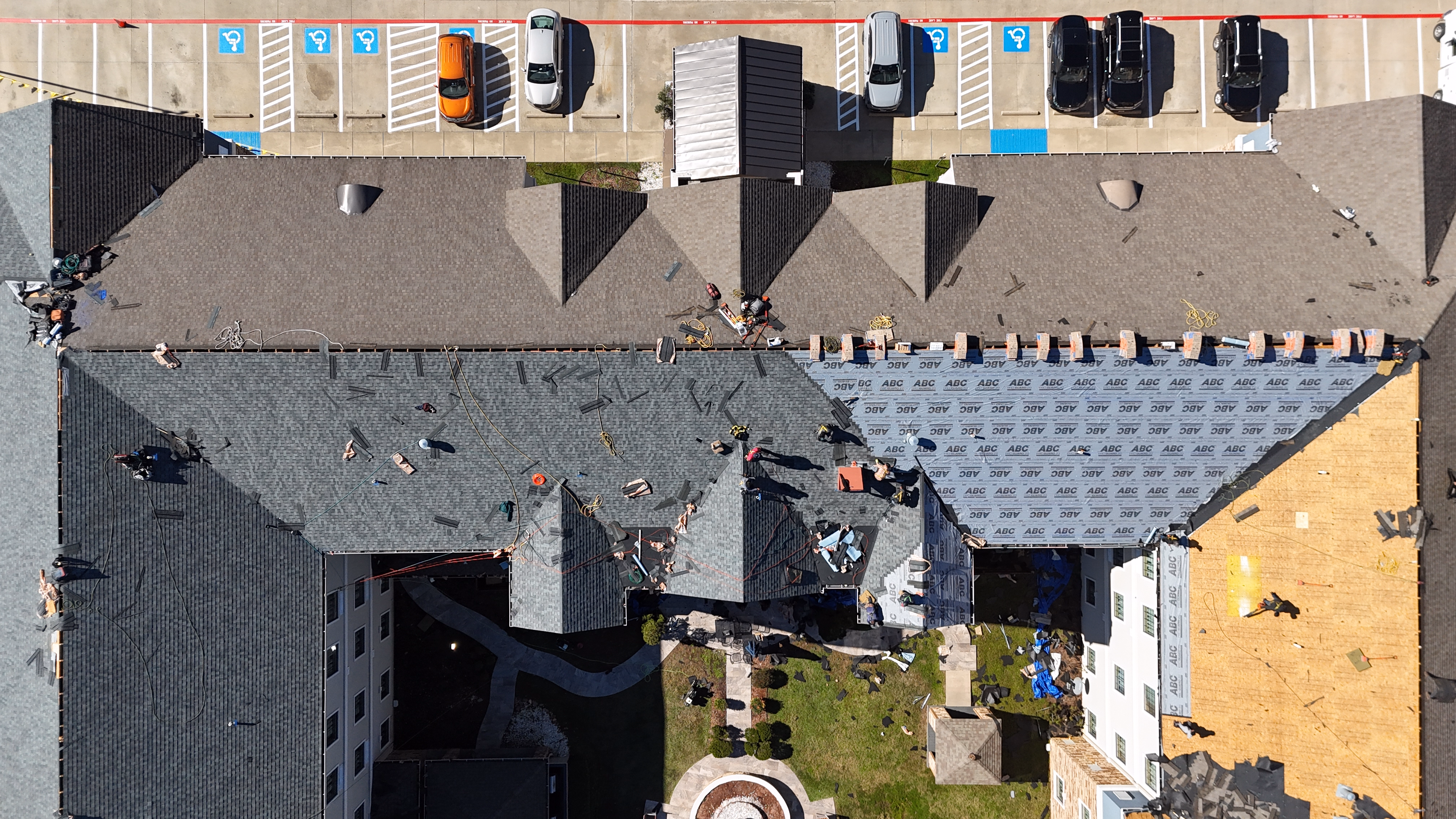 Commercial shingle roof replacement — East Texas building
